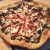 Greek Pizza with Feta, Dill, Arugula, Roasted Red Peppers and Kalamata Olives